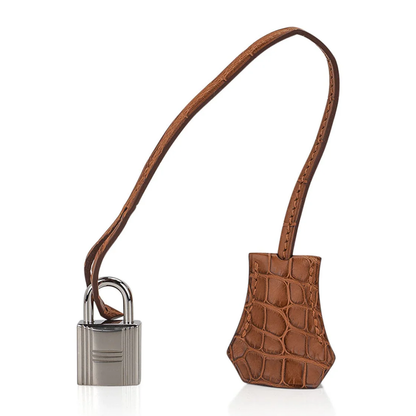 Warm Caramel Dual Texture Compact Structured Hand Tote With Textured Scaled Trim, Brushed Silvery Twist Lock Hardware And Matching Scaled Suspended Metal Padlock Charm