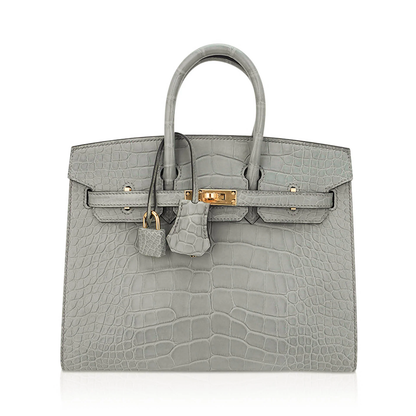 Muted Soft Concrete Grey Embossed Scaled Sharp Edged Compact Hand Tote With Luminous Golden Twist Lock Hardware And Matching Grey Suspended Metal Padlock Charm