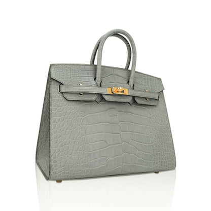 Muted Soft Concrete Grey Embossed Scaled Sharp Edged Compact Hand Tote With Luminous Golden Twist Lock Hardware And Matching Grey Suspended Metal Padlock Charm