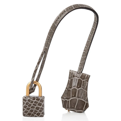 Sleek Dove Grey Glossy Scaled Grid Medium Structured Hand Tote With Deep Sapphire Blue Inner Lining, Brushed Golden Twist Lock Hardware And Matching Scaled Suspended Padlock Charm